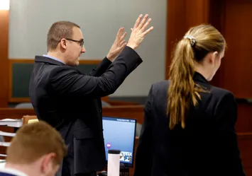 K. Ryan Helmick arguing before the judge at a bail hearing