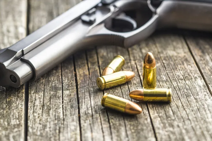 9mm pistol bullets and handgun.