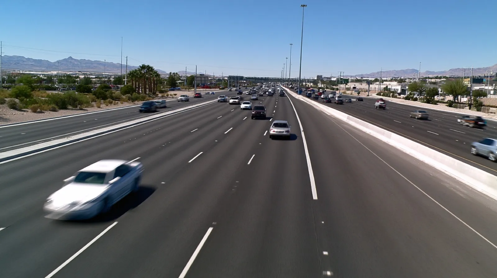 Vehicles traveling on a busy Nevada highway, representing driving conduct examined in fatal crash cases.