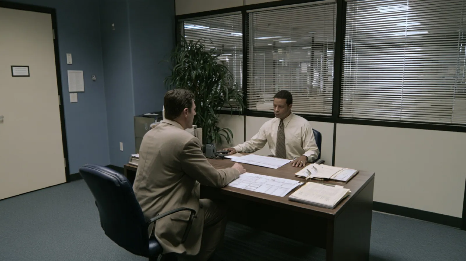 Attorney discussing sentencing documents with a client during preparation for a Nevada criminal case.