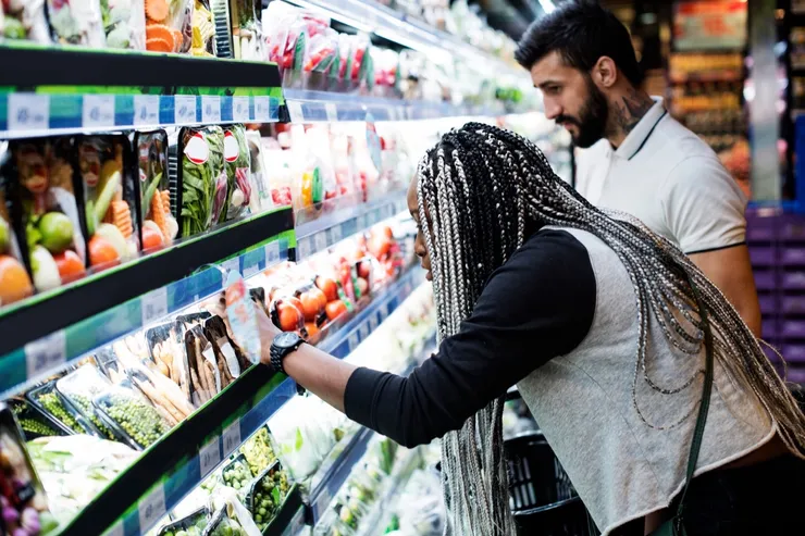 A couple shopping for food