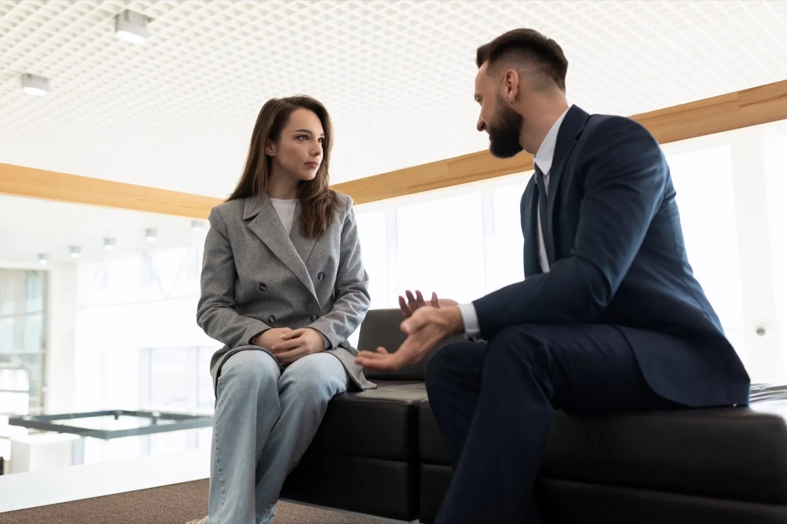a lawyer communicates with his client before starting a court case