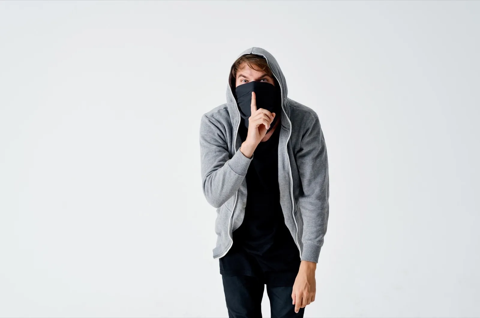 a man in a hood in a mask burglary theft anonymity crime
