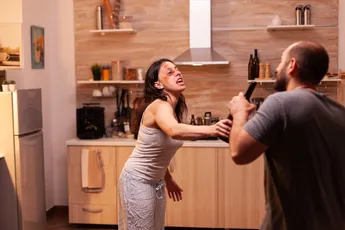 Abused wife fighting with husband