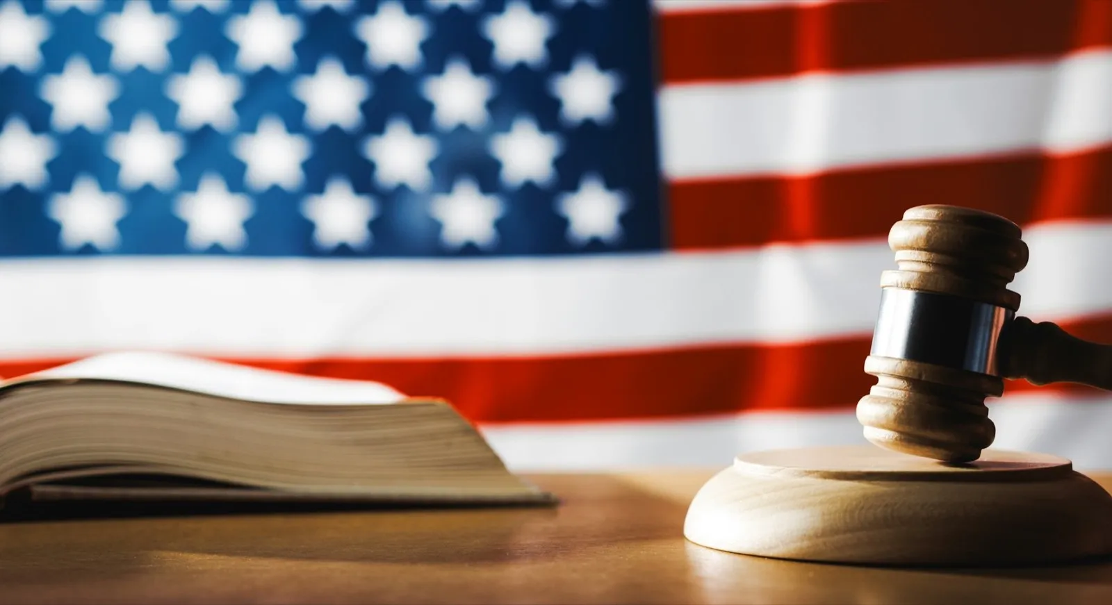 American judge beats with the gavel and gives the sentence in the courtroom.