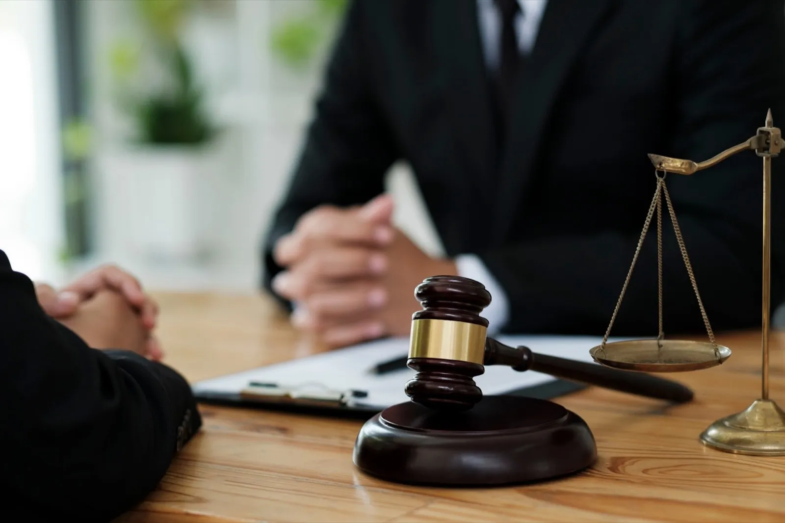 Attorney or lawer consulting client about his offense.
