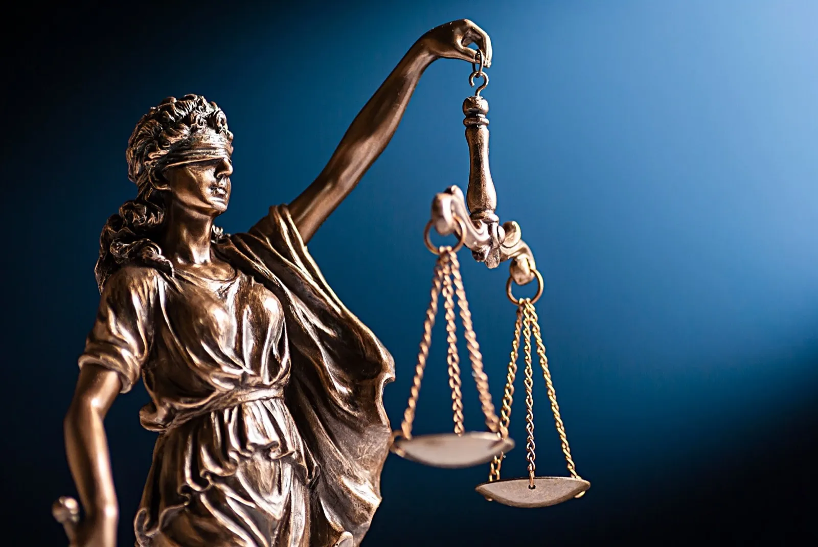 Bronze figurine of Lady Justice with her scales