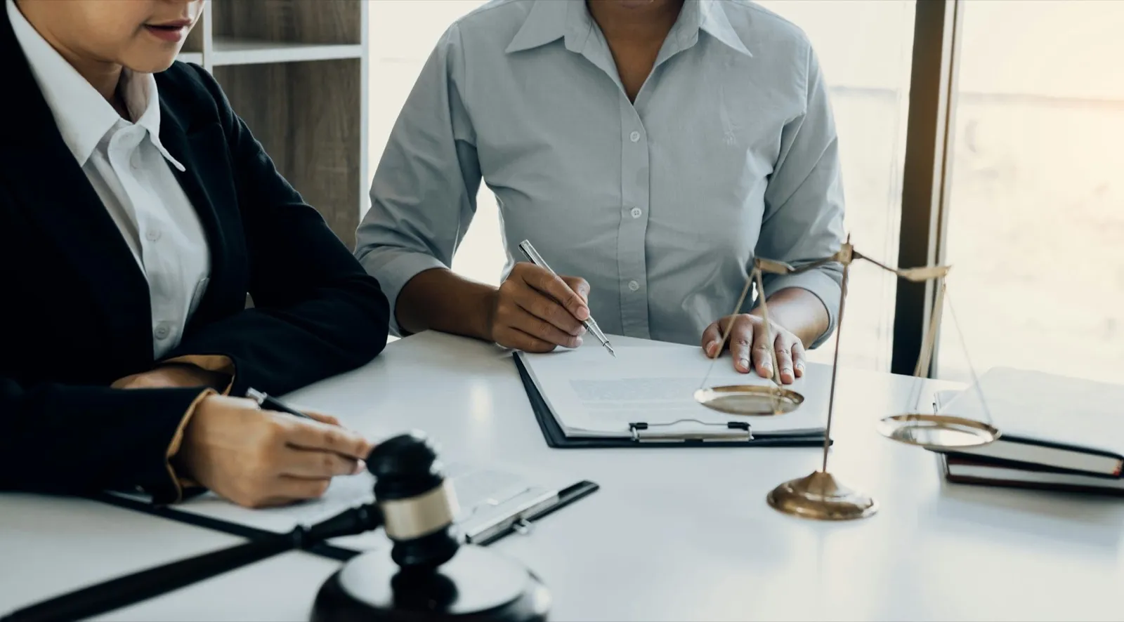 Business lawyer is currently counseling the client’s trial at the lawyer office.