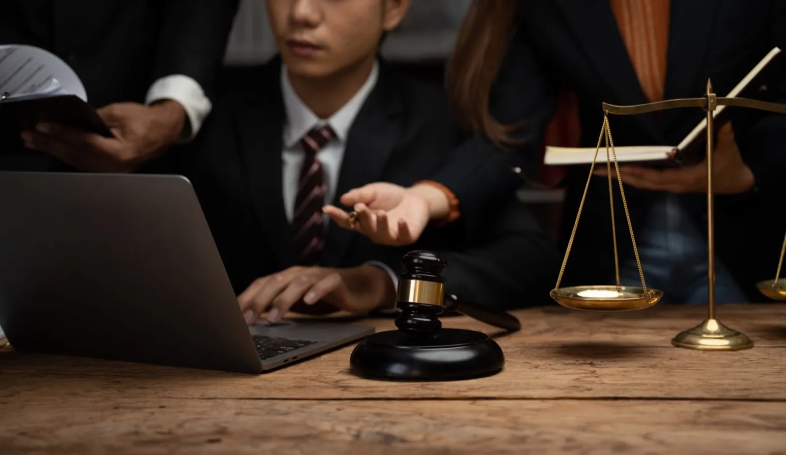 Close up lawyer businessman working or reading lawbook in office workplace for consultant lawyer con