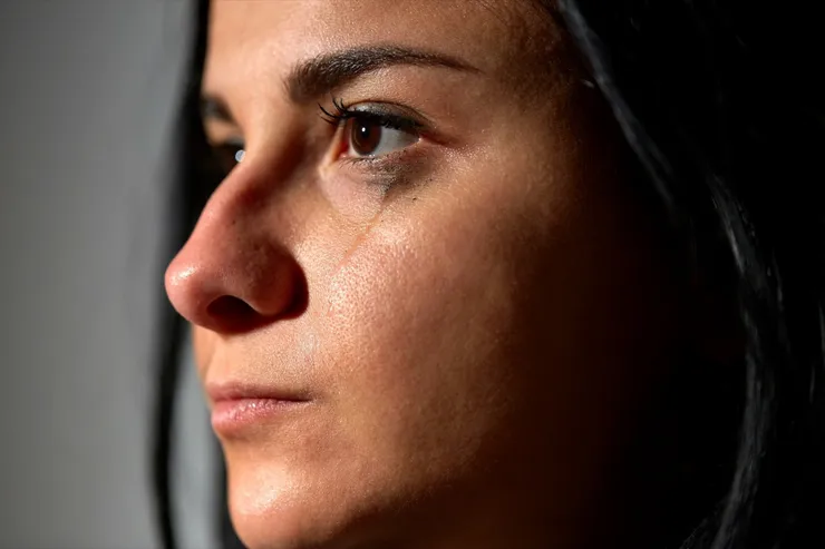 close up of unhappy crying woman