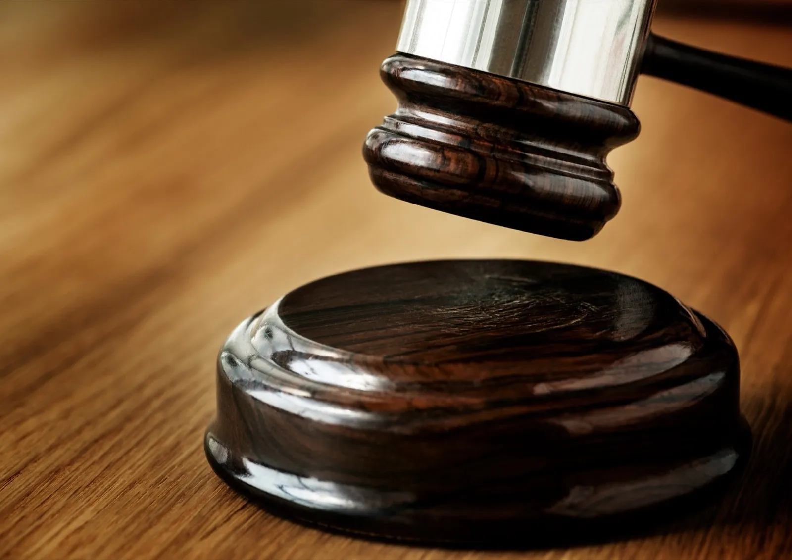 Closeup of stack of antique books auction, judgement and judical system concept