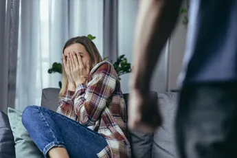 Domestic violence, angry husband shouting and beating woman, close-up photo