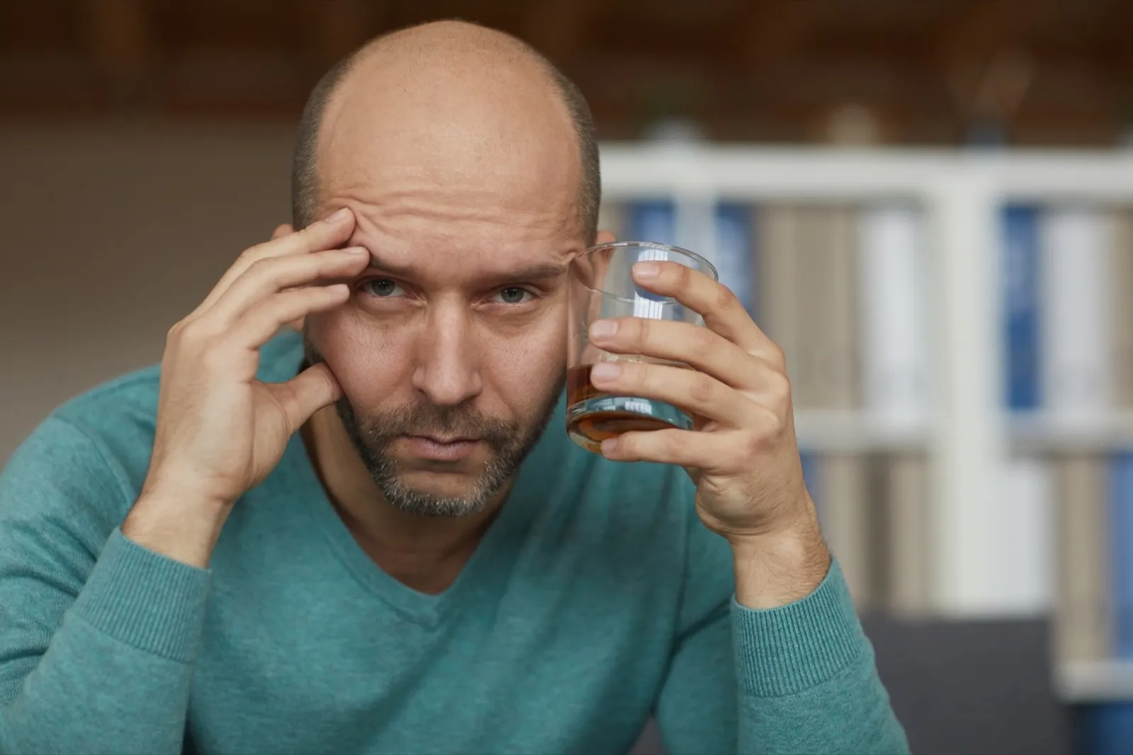 Drunk man with alcohol
