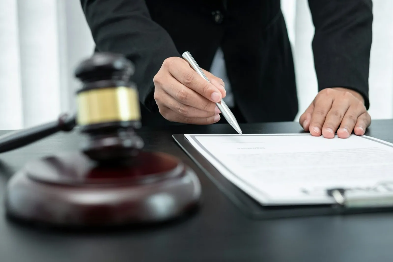 Female lawyer working with legal case document contract