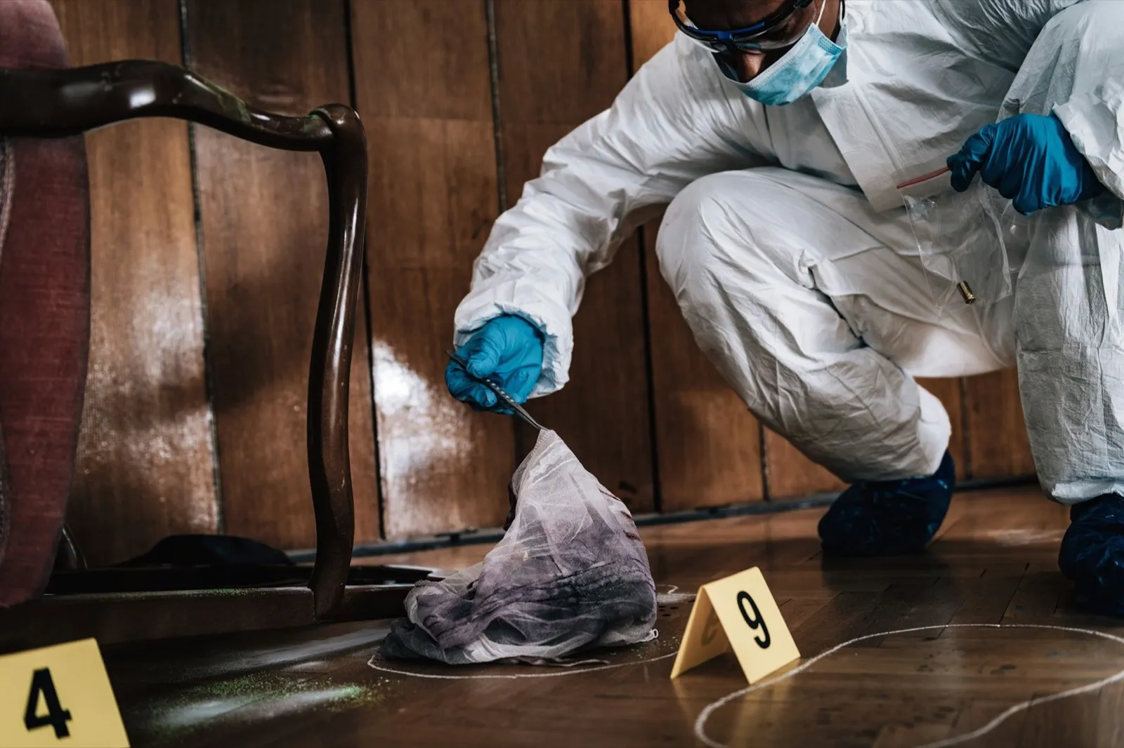 Forensic Investigator Collecting Evidence