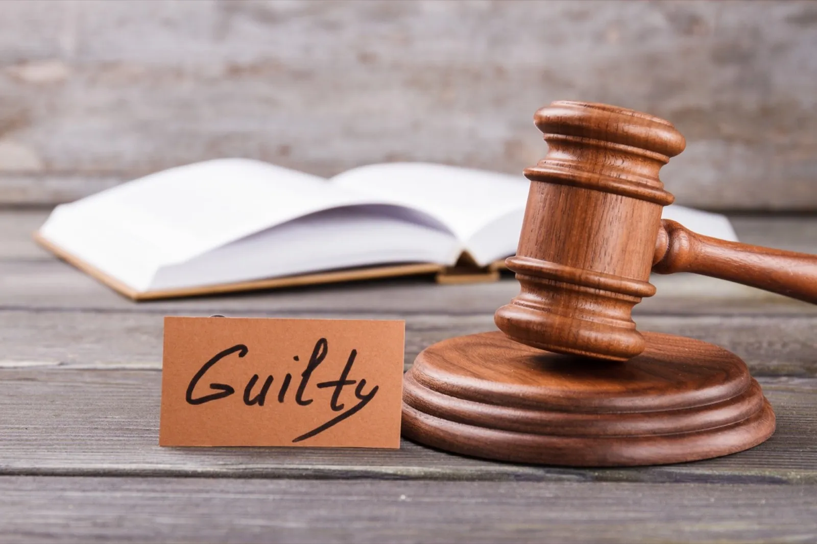 Gavel and guilty verdict.