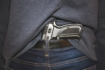 Handgun under belt