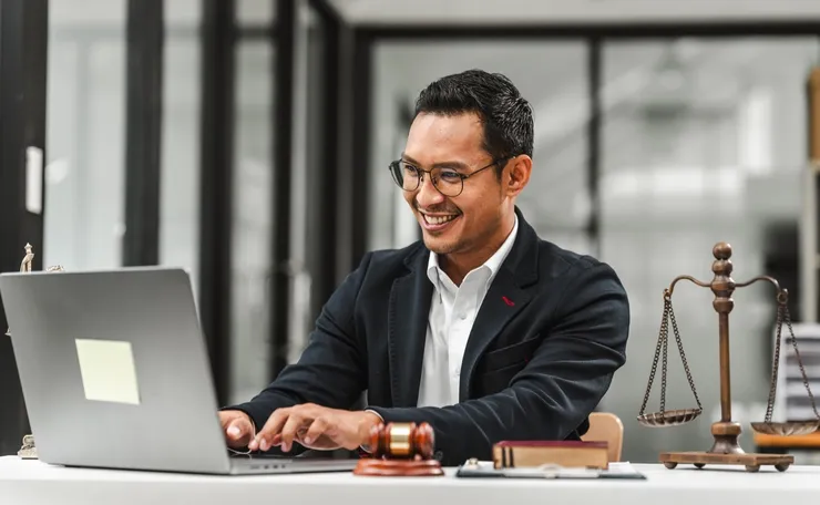Handsome businessman lawyer of Indian descent. trusted litigation lawyers attorneys.