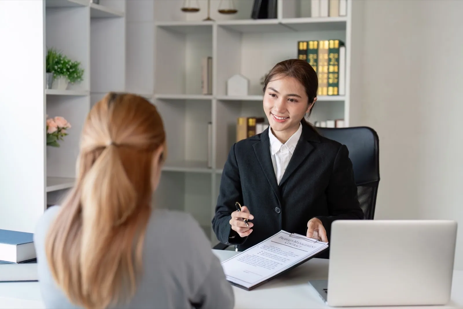 Lawyer consultation with client in modern office legal advice session professional environment