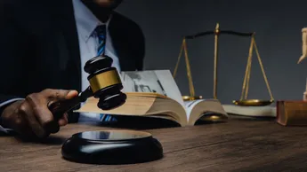 Lawyer showing judge gavel . Business Man hold judge gavel