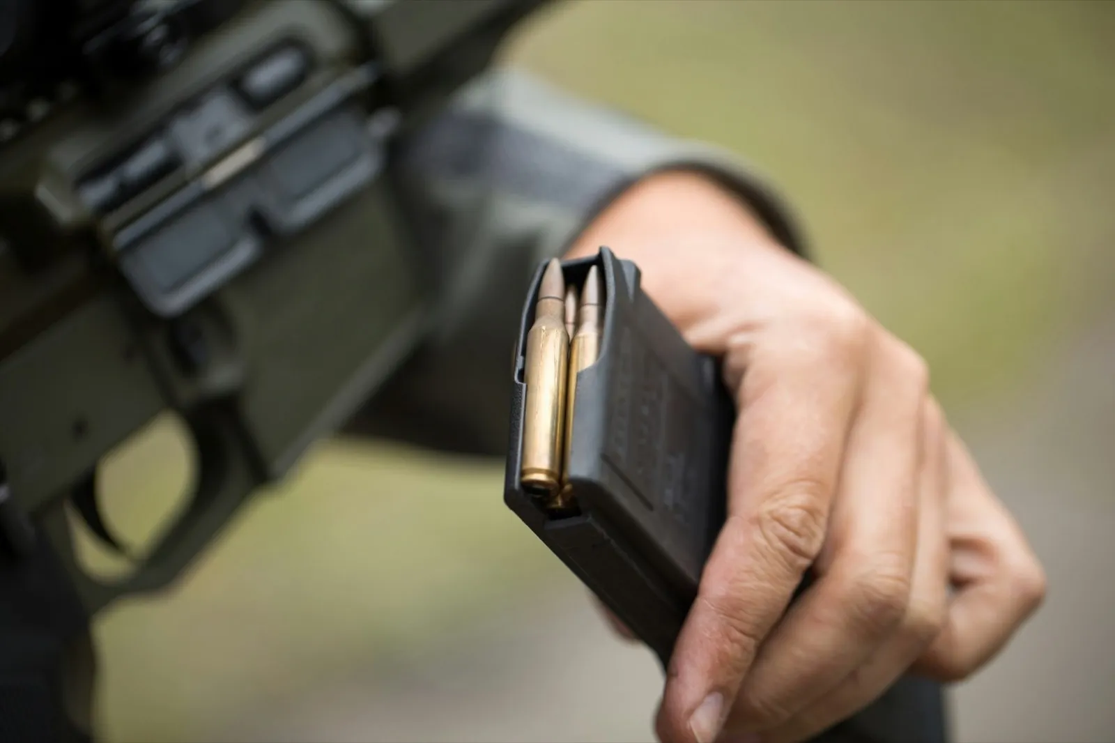 Loading ammunition into a clip. Reloading weapons
