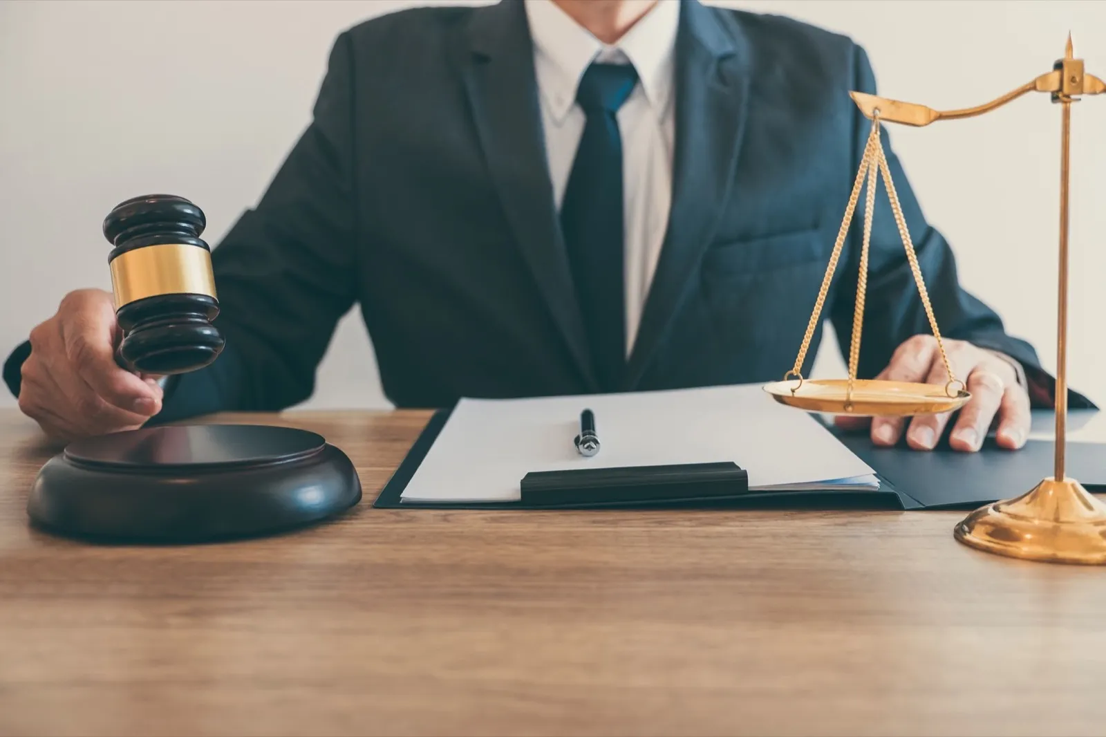 male lawyer or notary working on a documents and report of the important case in the law firm