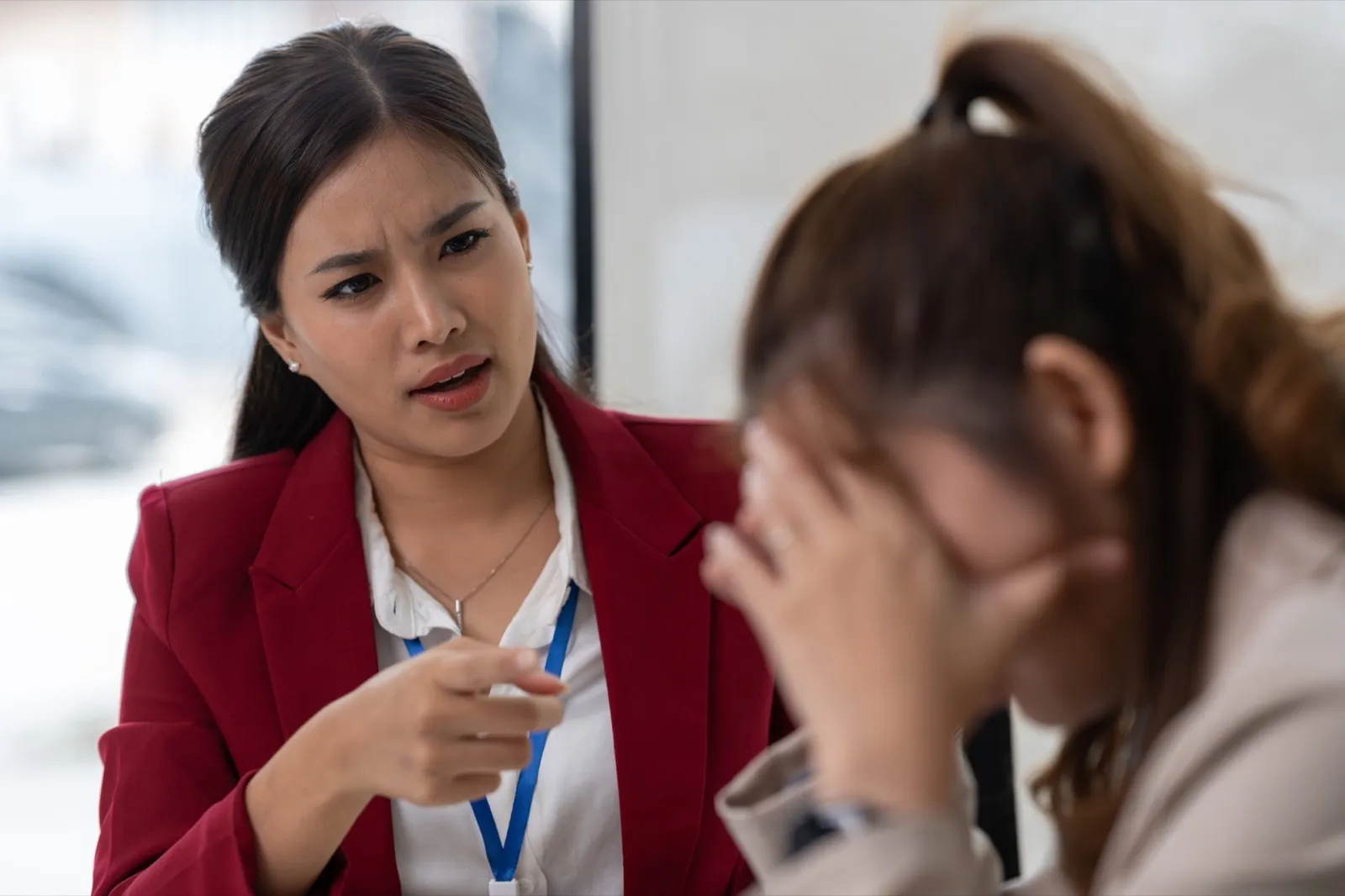 Managers or supervisors with Asian businesswoman being accused of work, stressed, tired of unsuccess