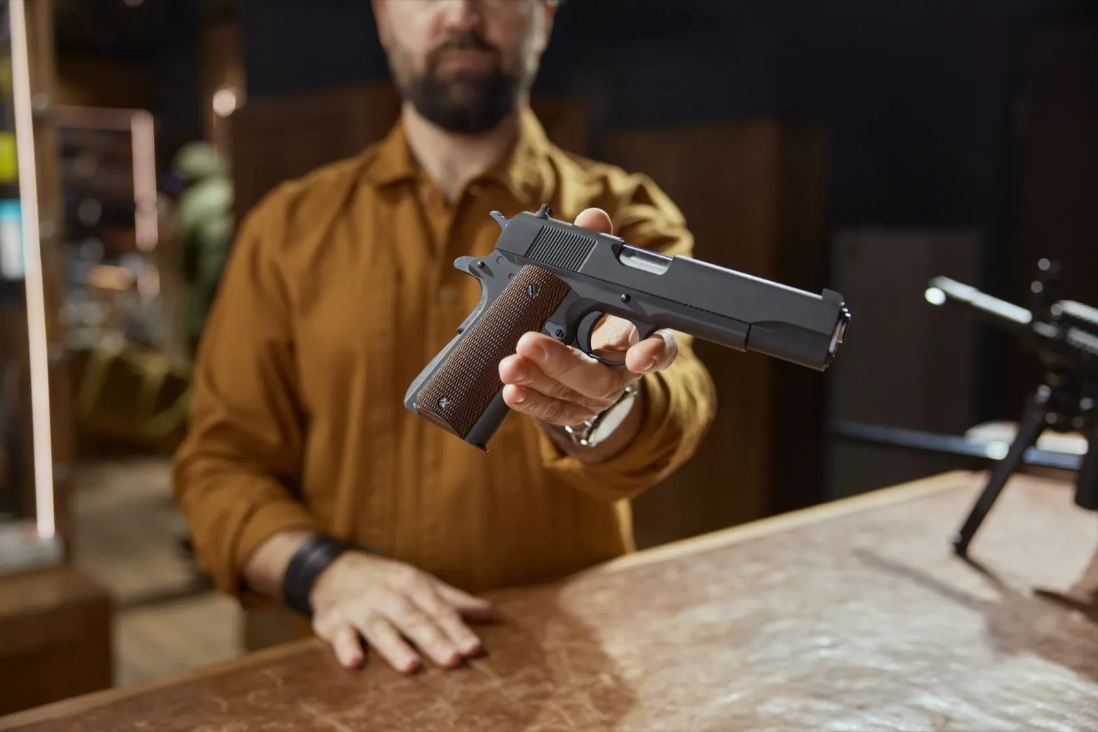 Modern automatic handgun selling at stocks of weapons
