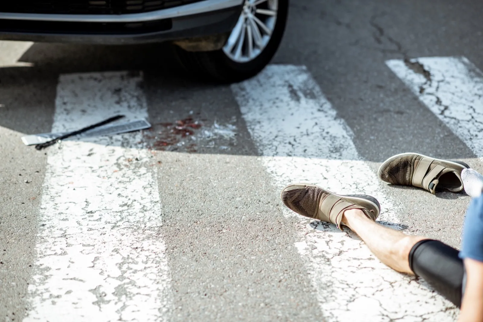 Road accident with injured man
