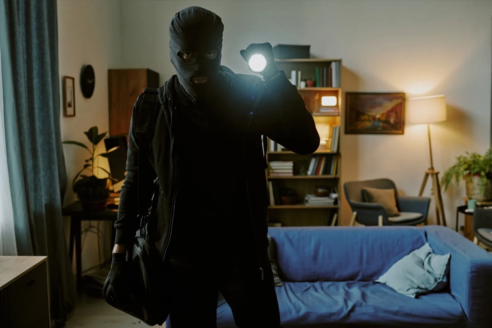 Unrecognizable Man in Balaclava Looking at Camera